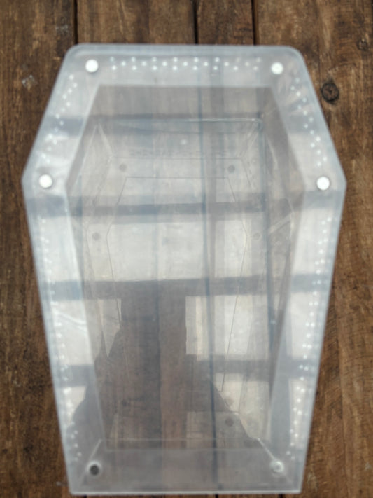 Coffin shaped enclosure 20cm longer x 14.5cm width at the widest points 10cm deep with strong magnetic lid.